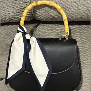 Elegant Black Handbag with Bamboo Handle